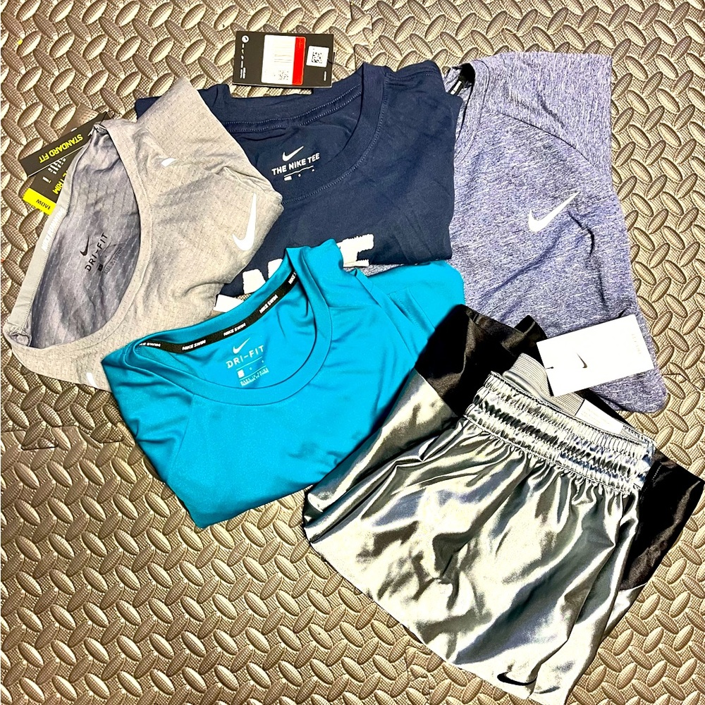 Nike Bundle: includes 5 tee shirts and 1 pair of shorts. NWT